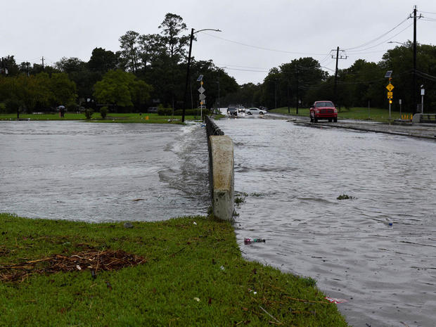 Brays Bayou flows over a bridge after Hurricane Harvey inundated the Texas Gulf coast with rain causing widespread flooding 