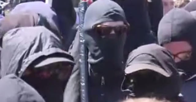 Black-clad anarchists storm large Berkeley anti-hate rally - CBS News