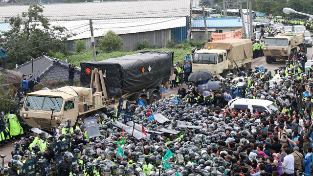 Parts of a Terminal High Altitude Area Defense (THAAD) system arrive at Seongju 