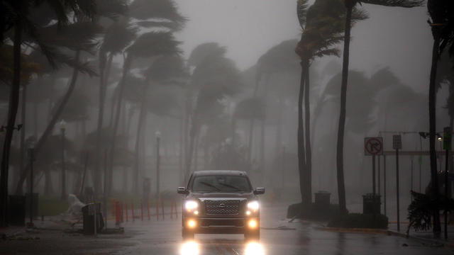 A vehicle drives along Ocean Drive in South Beach as Hurricane Irma arrives at south Florida, in Miami Beach 