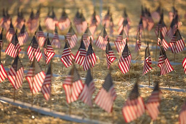 flags-arranged-in-rows-to-honor-americans-who-died-in-terrorist-attacks.jpg 