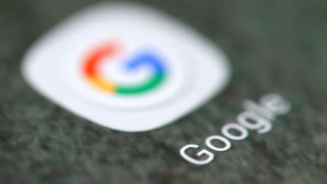 The Google app logo is seen on a smartphone in this illustration 