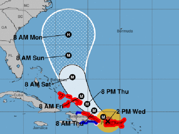 A map shows the probable path for Hurricane Maria as of 2 p.m. ET on Sept. 20, 2017. The M stands for "major hurricane." The red areas represent hurricane warnings. The blue areas represent tropical storm warnings. 