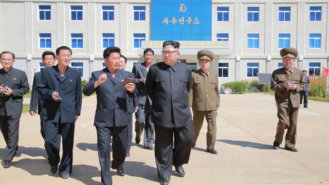 North Korean leader Kim Jong Un gives field guidance during a visit to a fruit orchard in Kwail county, South Hwanghae province 