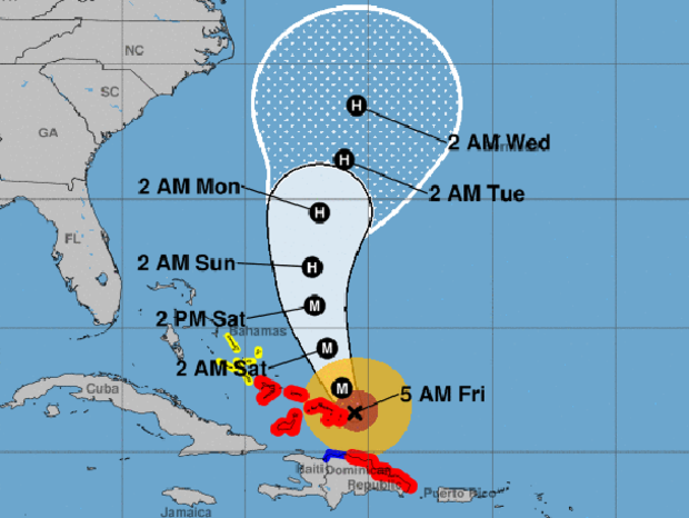 A map shows the probable path for Hurricane Maria as of 5 a.m. ET on Sept. 22, 2017. The M stands for "major hurricane." The red areas represent hurricane warnings. The blue areas represent tropical storm warnings. The yellow areas represent tropical storm watches. 