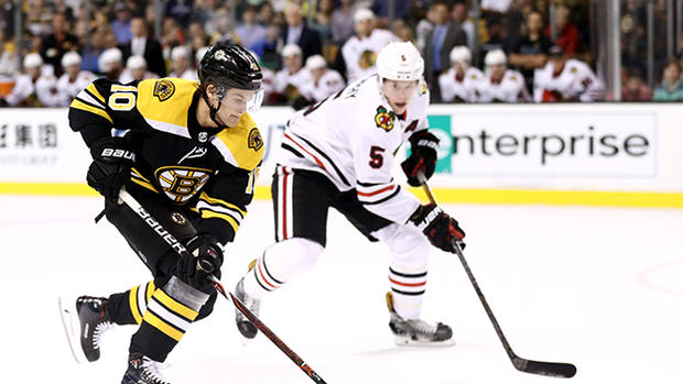 Anders Bjork, Connor Murphy - Chicago Blackhawks v Boston Bruins 