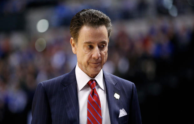 Head coach Rick Pitino of the Louisville Cardinals looks on in the first half against the Michigan Wolverines during the second round of the NCAA Men's Basketball Tournament at the Bankers Life Fieldhouse on March 19, 2017, in Indianapolis, Indiana. 
