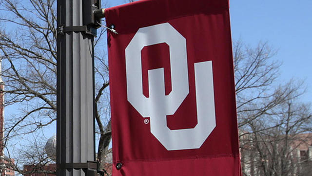 Students walk between classes in front of the Bizzell Memorial Library at the University of Oklahoma on March 11, 2015, in Norman, Oklahoma. 