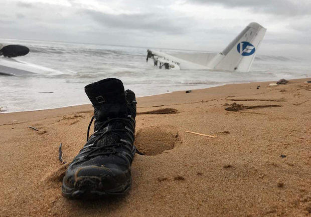 The wreckage of a propeller-engine cargo plane is seen after it crashed in the sea near the international airport in Ivory Coast's main city, Abidjan 