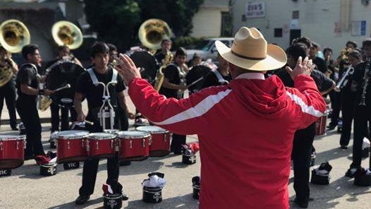 de-los-santos-conductingoutdoor.jpg 