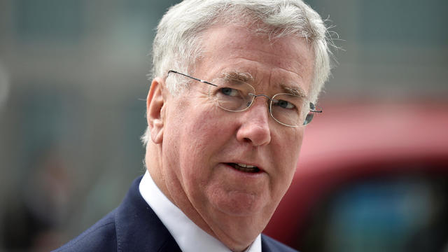 FILE PHOTO: British Defence Secretary Michael Fallon arrives at the National Cyber Security Centre in London 