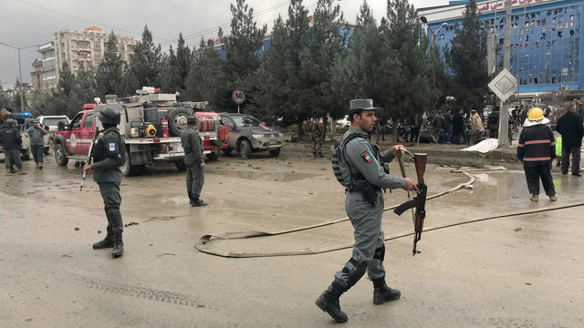 Afghan secuirty forces are seen at the site of an explosion in Kabul 