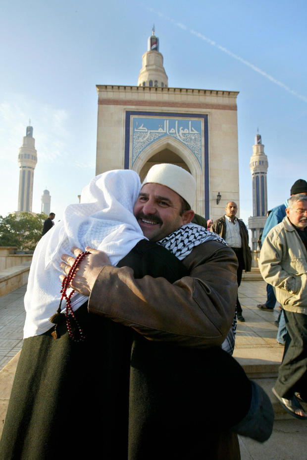 Sunni Muslims wish each other happy Eid 