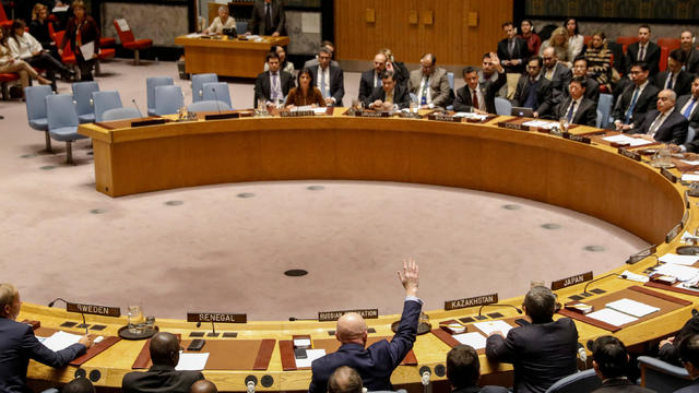 Russian Ambassador to the United Nations Vasily Nebenzya votes against a bid to renew an international inquiry into chemical weapons attacks in Syria, during a meeting of the U.N. Security Council at the United Nations headquarters in New York 