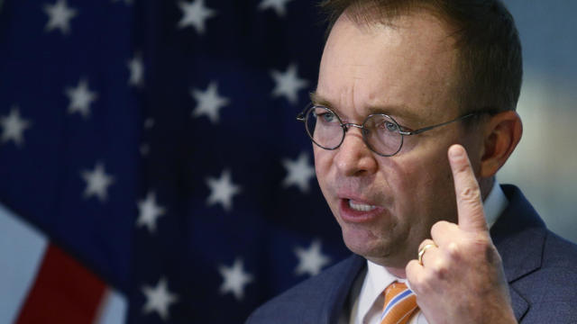 0MB Director Mulvaney speaks to the media at the U.S. Consumer Financial Protection Bureau in Washington 