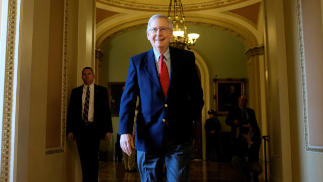 U.S. Senate Majority Leader Mitch McConnell (R-KY) leaves the Senate floor during debate over the Republican tax reform plan in Washington 