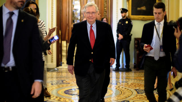 U.S. Senate Majority Leader Mitch McConnell (R-KY) leaves the Senate floor during debate over the Republican tax reform plan in Washington 