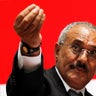 Yemen's then-President Ali Abdullah Saleh gestures during a gathering of supporters in Sanaa Feb. 20, 2011. 
