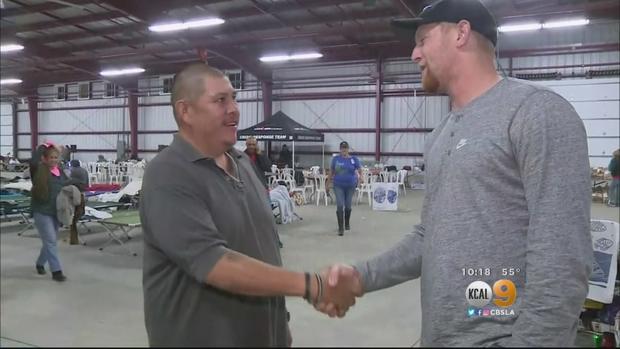 L.A. Rams punter Johnny Hekker greets fan at Ventura County evacuation center. 