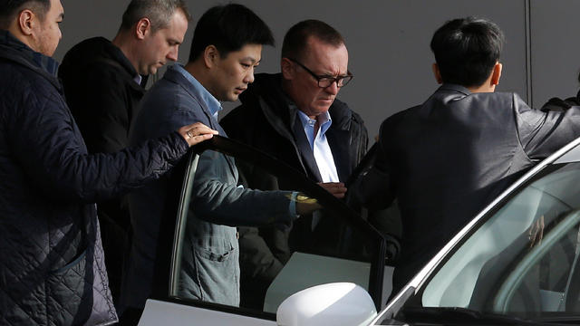 United Nations political affairs chief Jeffrey Feltman arrives at Beijing airport after his return from North Korea 