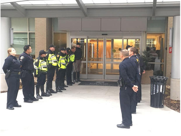 Officers lined up at Craig door 