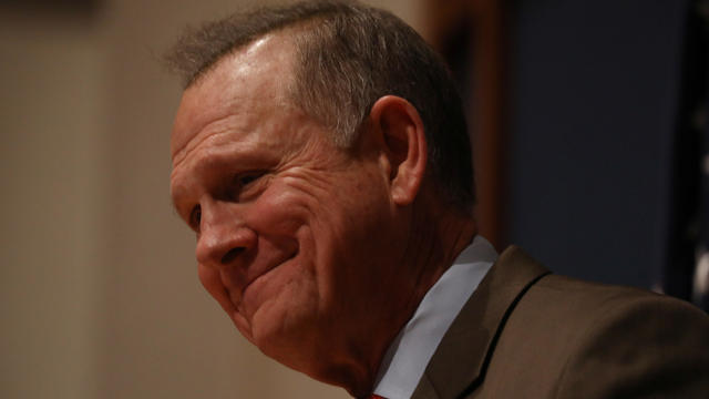 Republican U.S. Senate candidate Roy Moore pauses as he addresses supporters at his election night party in Montgomery 