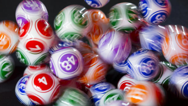 Colourful lottery balls in a sphere 