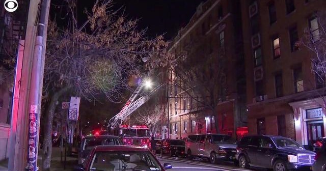 At least 12 dead after fire sweeps through Bronx apartment building ...
