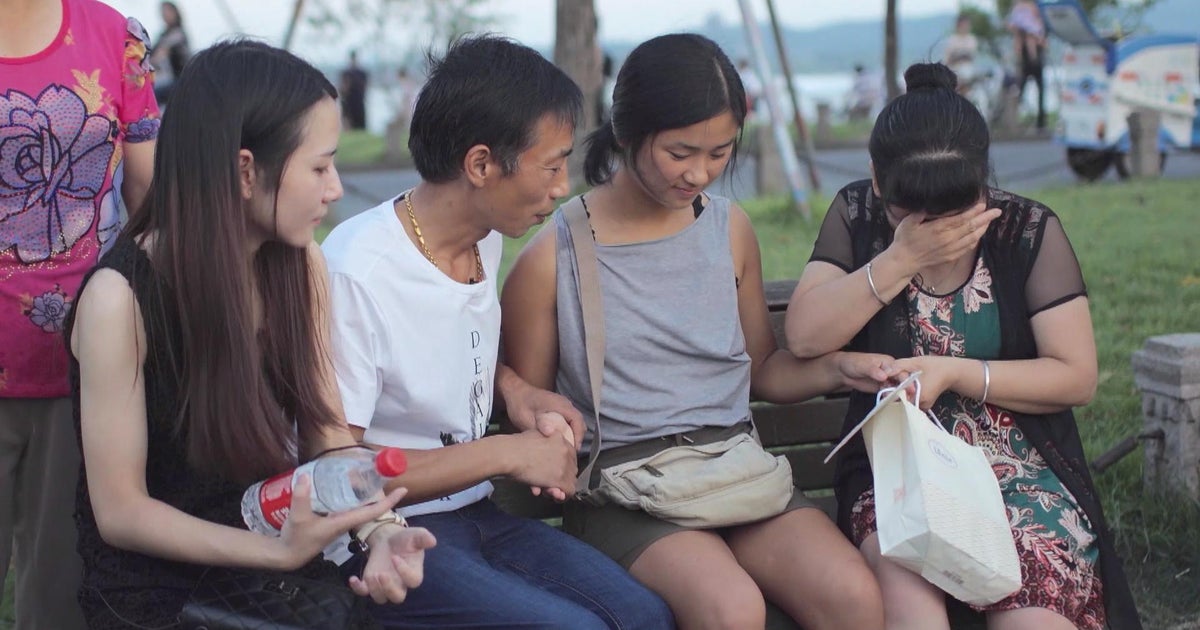 Woman adopted by American family reunited with Chinese birth parents ...