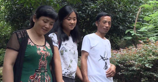 Woman adopted by American family reunited with Chinese birth parents ...