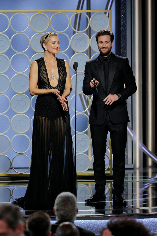 Presenters Kate Hudson and Aaron Taylor at the 75th Golden Globe Awards in Beverly Hills, California 