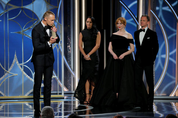 Alexander Skarsgaard kisses his award for  Best Performance by an Actor in a Supporting Role in a Series, Limited Series, or Motion Picture Made for Television for "Big Little Lies" at the 75th Golden Globe Awards in Beverly Hills, California 
