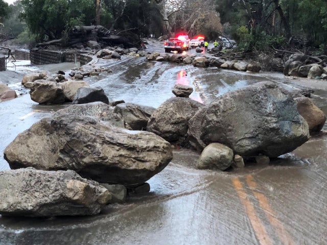 Boulders block a road after a mudslide in Montecito