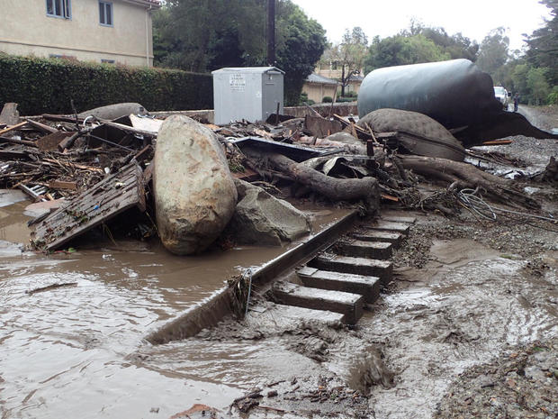 A section of the Union Pacific Railroad is blocked by mudflow and debris after a mudslide in Montecito 