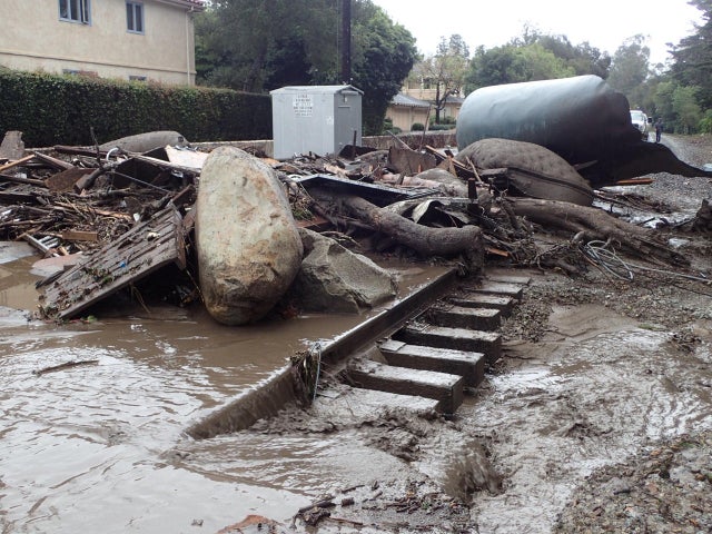A section of the Union Pacific Railroad is blocked by mudflow and debris after a mudslide in Montecito