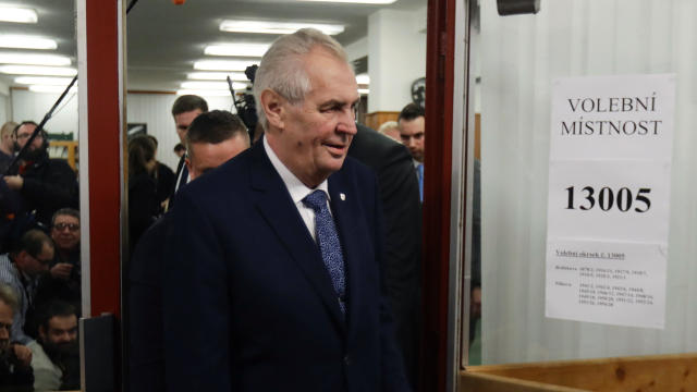 Czech President Milos Zeman arrives to cast a vote during the country's direct presidential election at a polling station in Prague 