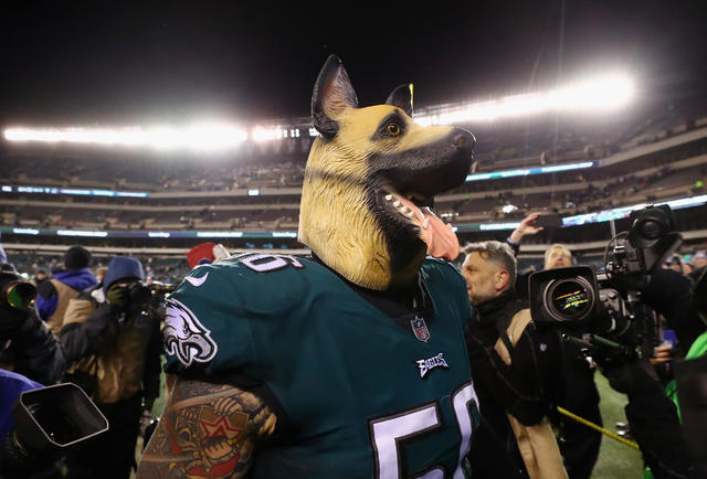 Eagles fans swarm Lincoln Financial Field in dog masks for NFC