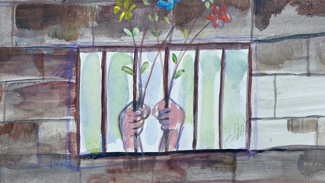 ansi-hands-holding-flowers-through-bars-promo.jpg 