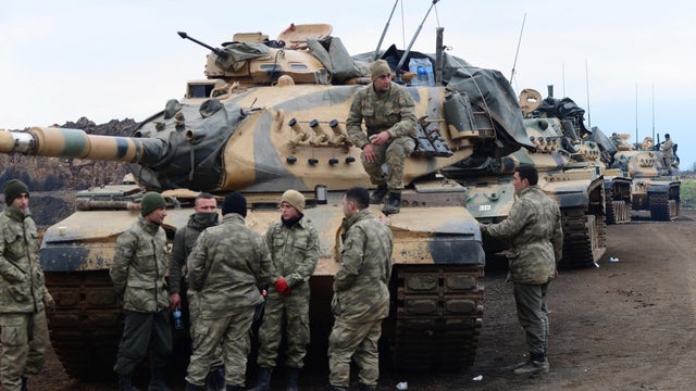 Turkish soldiers are seen near the town of Hassa on the Turkish-Syrian border in Hatay province 