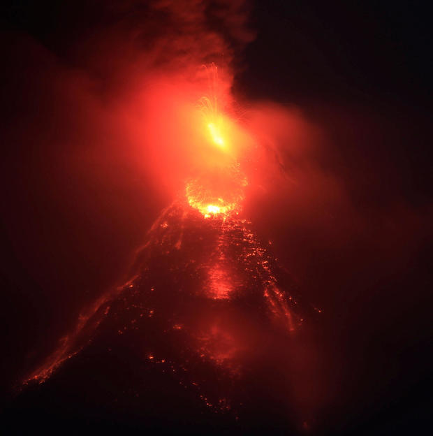 Lava flows from the crater of Mount Mayon Volcano during an eruption in Legazpi city 