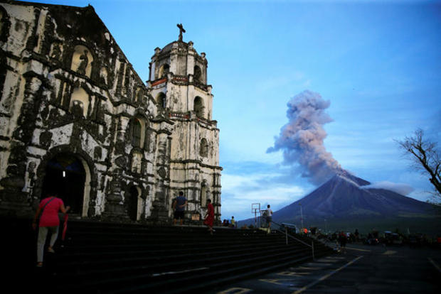 A view of Mount Mayon volcano as it erupted anew, from Our Lady of the Gate Parish church in Daraga, Albay province, south of Manila 