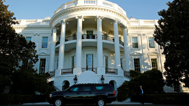 A vehicle pulls up in front of the White House to take U.S. President Barack Obama to Fort McNair for a game of basketball on election day in Washington 