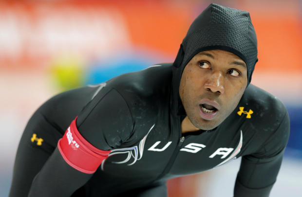 Shani Davis of the U.S. looks at his time after competing in the men's 1,000 meters speed skating race during the 2014 Sochi Winter Olympics in Russia Feb. 12, 2014. 