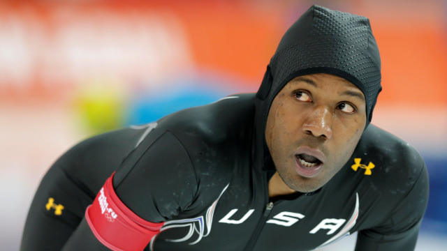 Shani Davis of the U.S. looks at his time after competing in the men's 1,000 meters speed skating race during the 2014 Sochi Winter Olympics in Russia Feb. 12, 2014. 