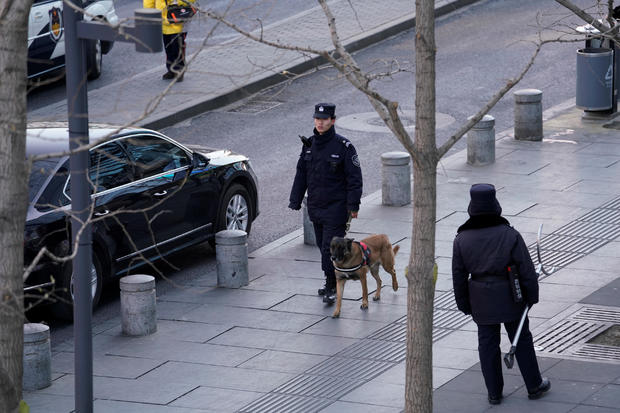 Police patrol outside the Joy City Mall in the Xidan district after a knife attack, in Beijing 
