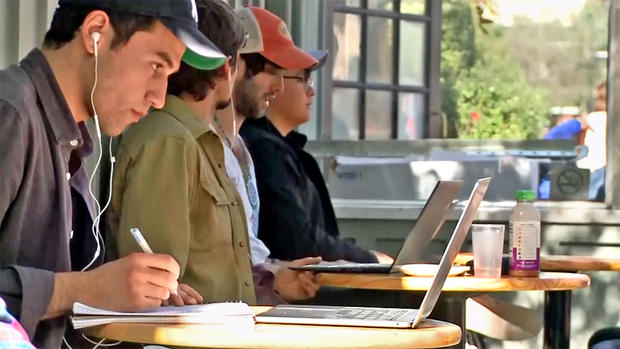Cafe Patrons in Berkeley Work on Laptop Computers 