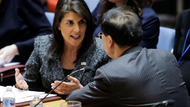 U.S. Ambassador to the United Nations Haley speaks to China's ambassador to the U.N. Zhaoxu before the United Nations Security Council vote for ceasefire to Syrian bombing in eastern Ghouta, at the United Nations headquarters in New York 
