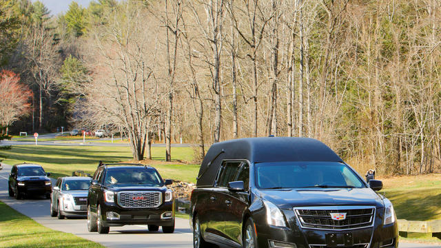 Hearse carrying body of evangelist Graham arrives at The Cove in Asheville, North Carolina 