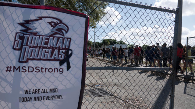 Students and parents arrive for campus orientation at Marjory Stoneman Douglas High in Parkland 