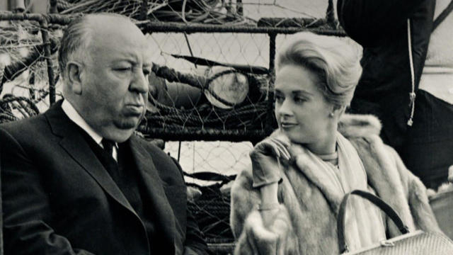 alfred-hitchcock-and-tippi-hedren-on-set-of-the-birds-promo.jpg 